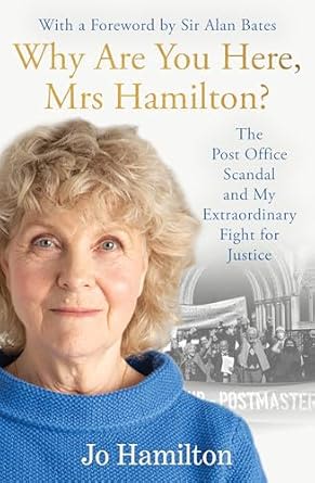 Whay are you here Mrs Hamilton Cover. Shows Jo wearing a blue jumper smiling at the camera.